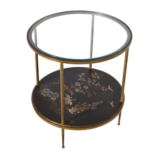 Angled view of the two-tier side table with a glass top and lacquered lower shelf, highlighting the decorative Japanese-inspired design and gold-tone frame.