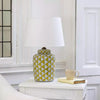 Lemon and white coloured, urn shaped ceramic lamp with a bright white fabric shade. Will brighten any room you place it in, a touch of summer, even in the darkest seasons.&nbsp; The diagonal lemon pattern on a white background has a great contemporary feel, perfect in a modern home and the ceramic finish is a classic for a period home.&nbsp; An ideal lamp for creating a cosy atmosphere combining functionality with a chic design.&nbsp;