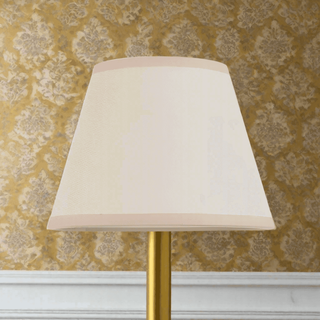 Light cream lamp shade with a classic tapered design, 20cm size, ideal for vintage or traditional lighting décor in home interiors.