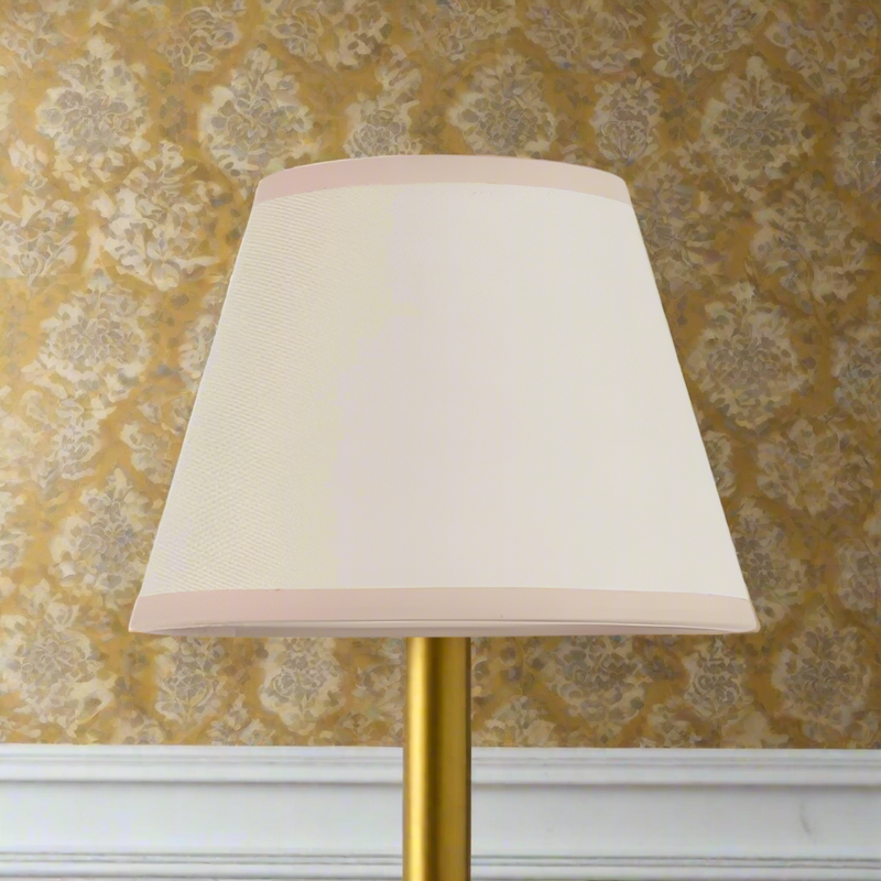 Light cream lamp shade with a classic tapered design, 20cm size, ideal for vintage or traditional lighting décor in home interiors.