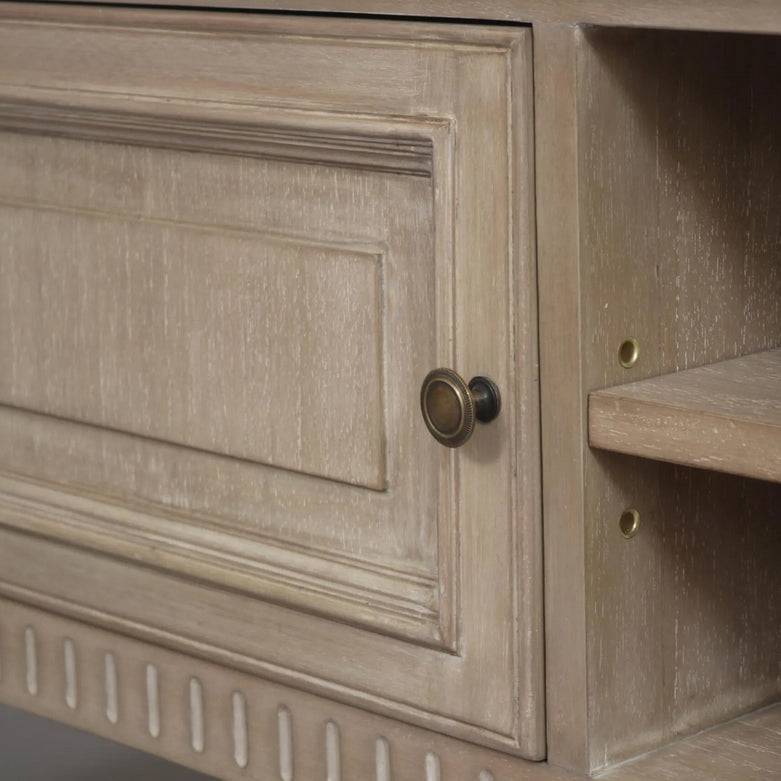 A classic low TV unit. This is a very pretty hardwood piece made from Mindi wood, finished in an ash lime wash veneer finish