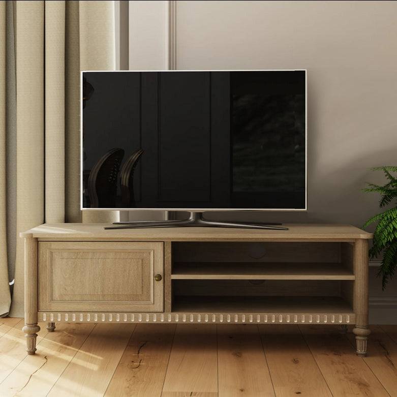 A classic low TV unit. This is a very pretty hardwood piece made from Mindi wood, finished in an ash lime wash veneer finish