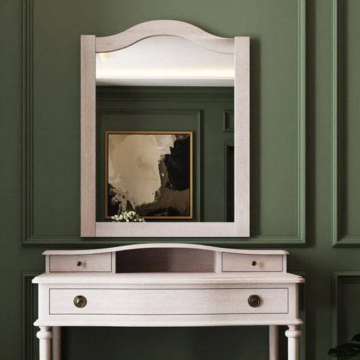 A solid hardwood mirror made from bleached mahogeny wood with ash veneers in a white wash finish. The frame has a light finish, giving it a rustic, vintage feel.