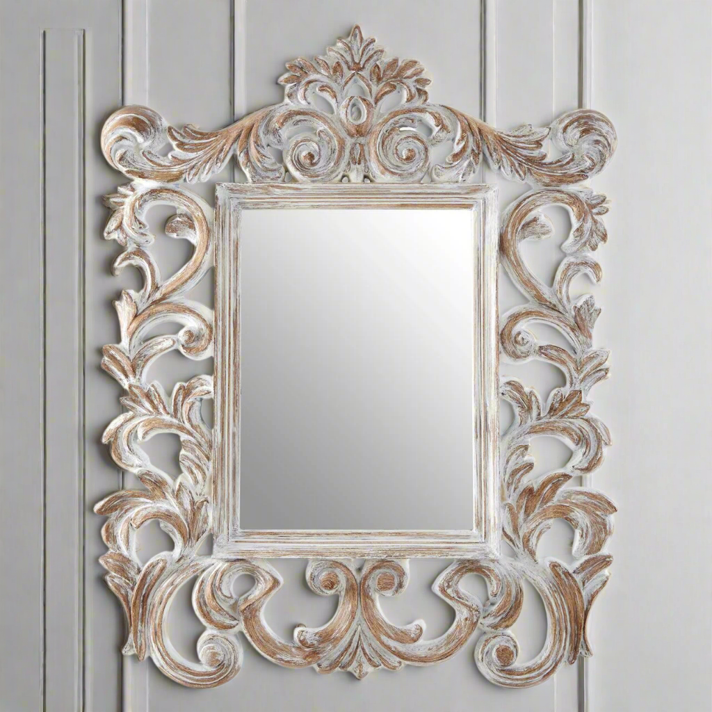 Stunning, limewashed aged pierce framed mirror, exceptional style and size. The decorative fleur de lis frame adds to its vintage feel.&nbsp; Perfect way to create a classic, decorative feel in your room.&nbsp; In a hall on a landing, bedroom or over a fireplace the most decorative ornate mirror in an understated finish. Mirrors in Chiswick and West London large range of overmantles online.