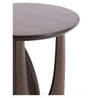 A contemporary side table in mango wood.&nbsp; A dark chocolate coloured table in a sculptural design.&nbsp; A beautiful, stylish modern side table which would work well in a mid-century or industrial interior.&nbsp; The solid mango finish is sturdy and hard wearing. A stylish classic.&nbsp;
