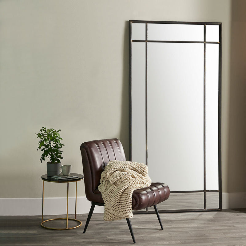 Exceptionally tall metal framed mirror, a large industrial statement mirror giving you great light and space in any room.&nbsp; A huge mirror in black metal would be perfect in an indoor or outdoor space, in a kitchen or on your patio to brighten up your garden space.