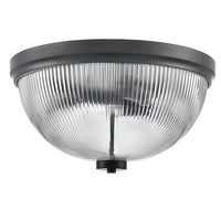 Flush mount ceiling light fixture with a ribbed clear glass shade and a matt black metal frame