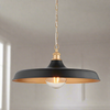 Modern pendant featuring a matt black finish in a chain. This wide disc pendant light is a striking, contemporary lighting fixture that combines sleek design with industrial charm. 
