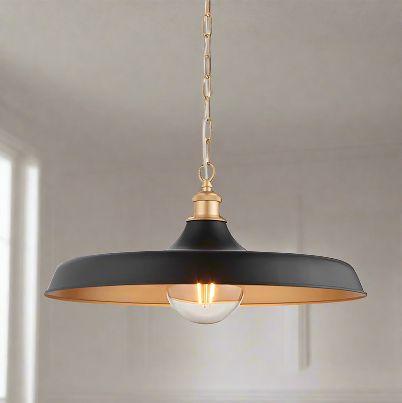 Modern pendant featuring a matt black finish in a chain. This wide disc pendant light is a striking, contemporary lighting fixture that combines sleek design with industrial charm. 