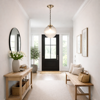 Ribbed glass globe pendant with antique brass fittings. ideal hall light or in a kitchen, over an island, a versatile light to suit any decor.