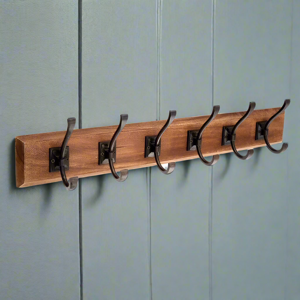 Useful storage hooks - strong, good quality, made to help you declutter your hall. Made from solid wood and iron, this hanging storage solution is made to last.