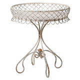 <p>Tall, white metal outdoor or conservatory table. With a decorative galleried top on four legs.  Filled with plants or two large glasses of red, this table is perfect outdoors or inddors.<br></p> <p> </p>