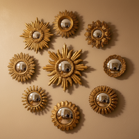 Sun shaped mini convex gold framed mirrors which come in an assortment of sizes. This is a fantastic price and range which takes the headache out of creating your own wall assortment.