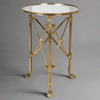 Antique brass and glass occasional table with multi support legs and struts.&nbsp; A really stunning statement side table that will add a lot of style to your sitting room.&nbsp; The main support of 3 antique brass footed legs is complimented by cross braces to give an architectural look. Exceptional quality and a nod to an Empire design.


H: 58 cm W: 43 cm&nbsp;