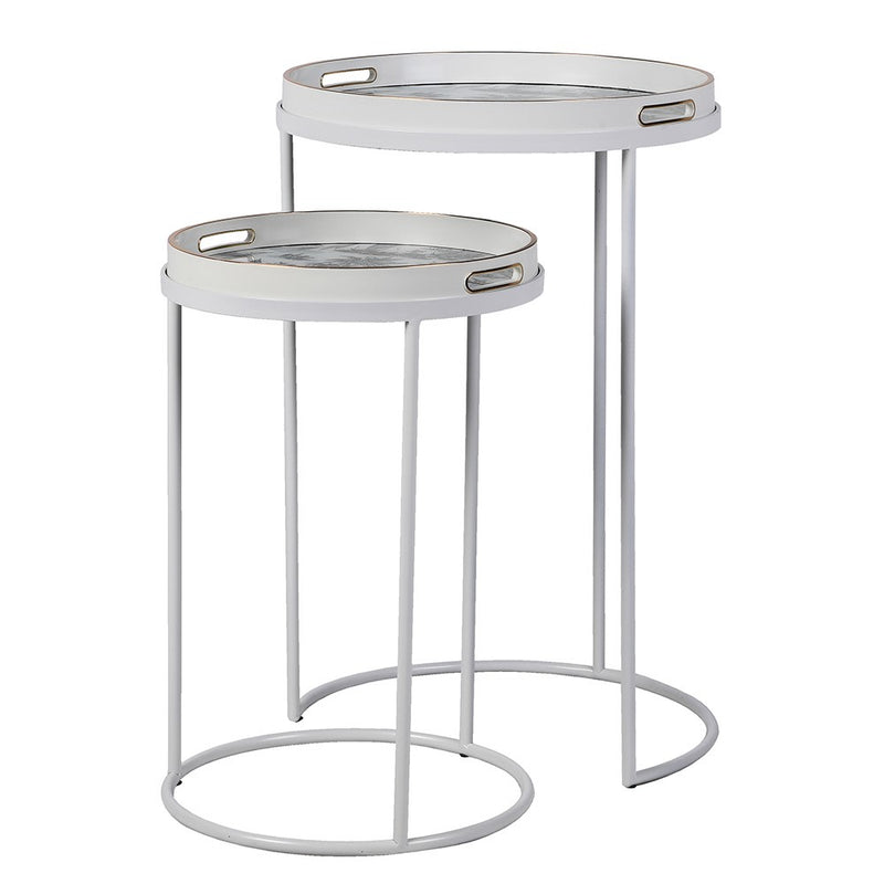 A very unusual set of two side tables, one nested below the other, circular tables on a white metal frame.&nbsp; The trays, which are detachable and can be used independently, have a traditional blue and white willow pattern style print on them. They are set off with a gold rim to the edge of the trays which lifts them and gives them a luxurious look. They combine modern minimalism with a classic scenic decorative top. Perfect in a contemporary setting, a cottage or period home.&nbsp;