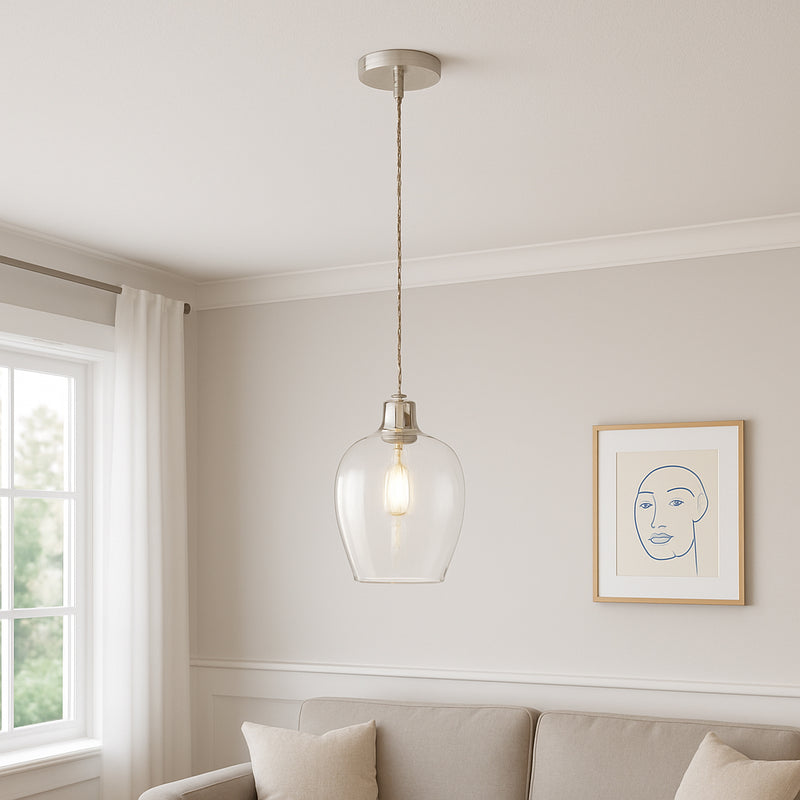 Tall clear glass pendant with nickel fitting and grey twisted flex. Over a kitchen island, in a hall or on a stairwell, very versatile lighting