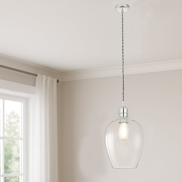 Tall clear glass pendant with nickel fitting and grey twisted flex. Over a kitchen island, in a hall or on a stairwell, very versatile lighting