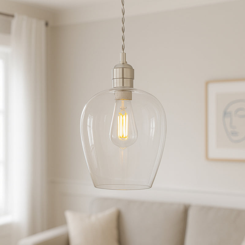 Tall clear glass pendant with nickel fitting and grey twisted flex. Simple pendant but with a lot of impact, you can easily double up or triple up with this pendant. Over a kitchen island, in a hall or on a stairwell, very versatile lighting