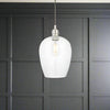 Tall clear glass pendant with nickel fitting and grey twisted flex. Simple pendant but with a lot of impact, you can easily double up or triple up with this pendant. Over a kitchen island, in a hall or on a stairwell, very versatile lighting