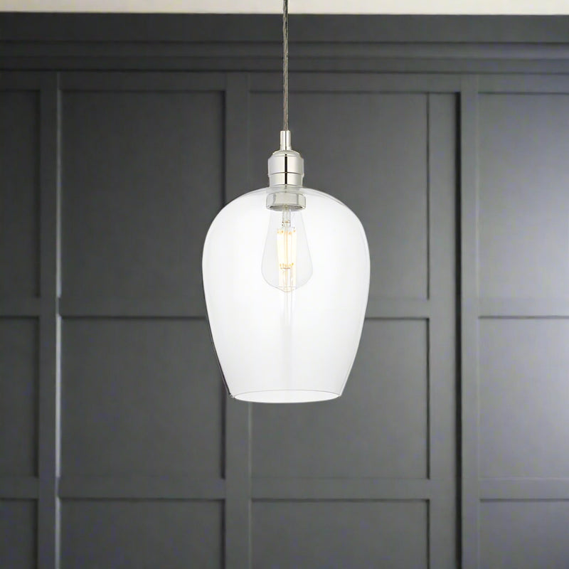 Tall clear glass pendant with nickel fitting and grey twisted flex. Simple pendant but with a lot of impact, you can easily double up or triple up with this pendant. Over a kitchen island, in a hall or on a stairwell, very versatile lighting