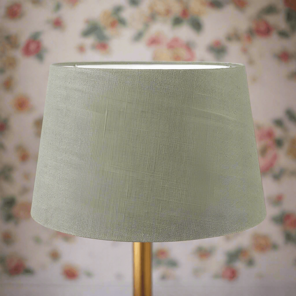 A beautiful olive green colour linen tapered lamp shade perfect to pair with a ceramic or stoneware lamp base. Available in five sizes