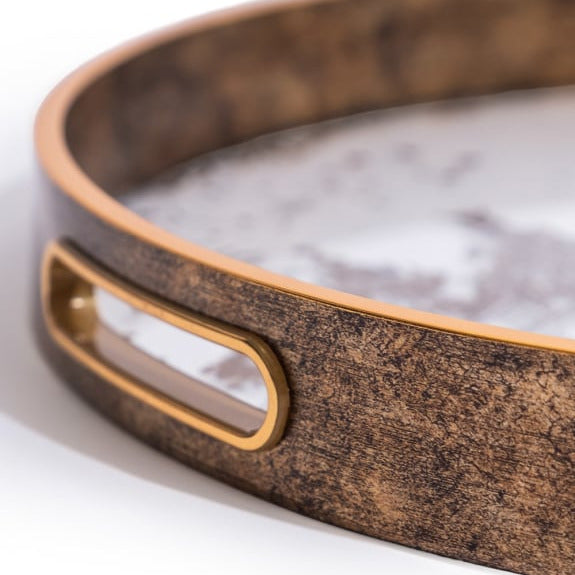 These decorative trays are a simple yet impactful way to elevate your space. They offer both style and function, helping you keep things organized while also contributing to your home's aesthetic