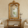 Transform any room with our ornate giltwood wall mirror. Measuring 158 x 85 cm, this exquisite piece is a true testament to Georgian neoclassical design, featuring intricate carvings of swags, garlands, and acanthus leaves.