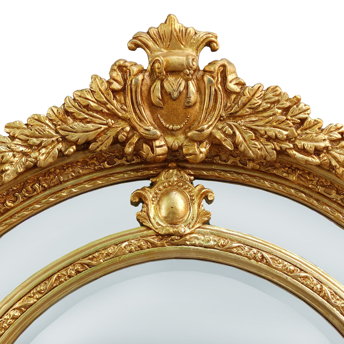 Extremely ornate arched gold mirror with beveled panels.&nbsp; This statement mirror would look amazing in a hallway, just opening up the space and adding a luxurious air to your entryway. In a living room to flash out light and give the illusion of extra space.&nbsp; Stunning rococo revival style with swags and medallions to the crown and heavily ornamented frame. The gilding is a beautifully opulent gilt leaf giving the frame an opulent lustre.&nbsp;&nbsp;

There is no room in the house that would not ben