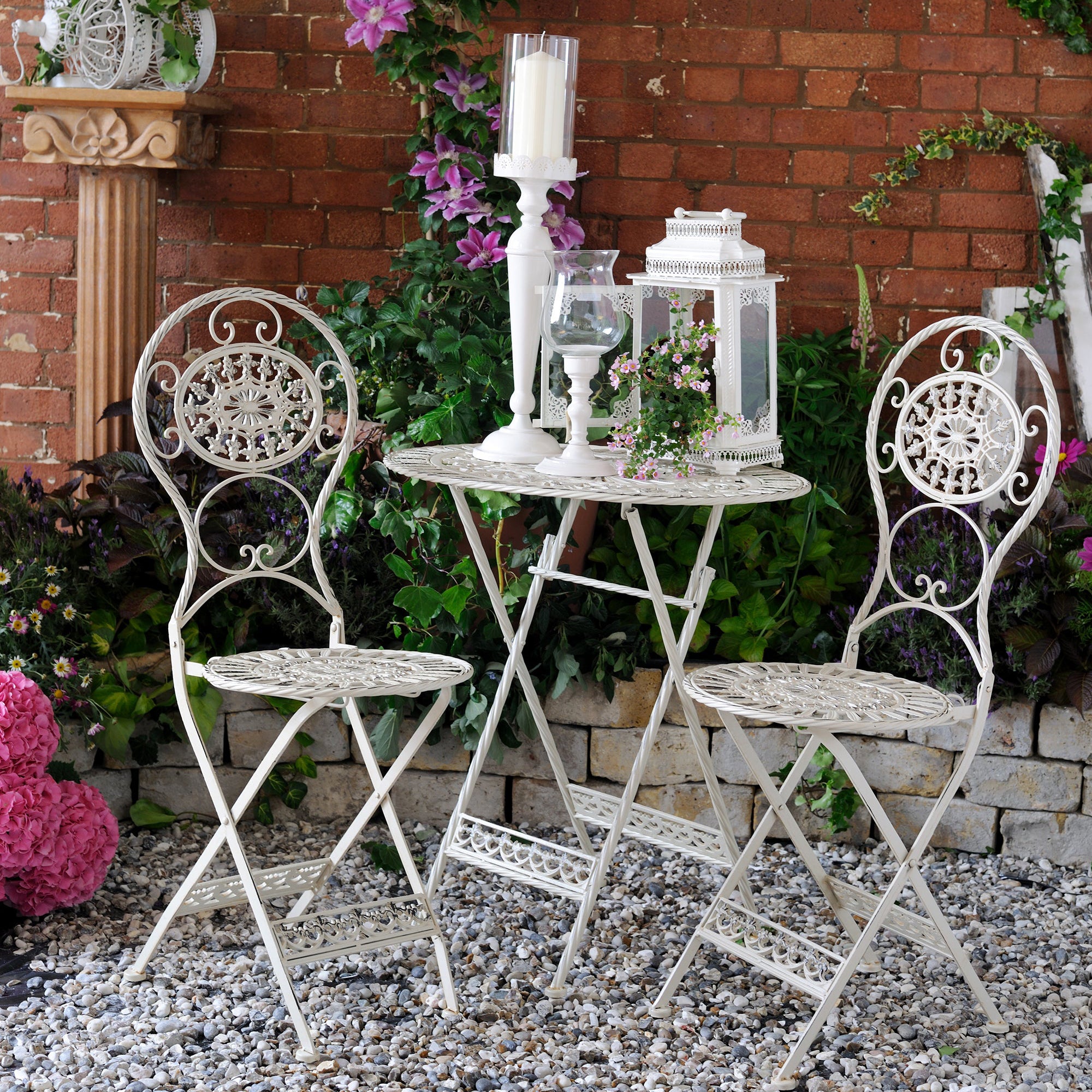 Enjoy your outdoor living space with this oval metal folding patio set.