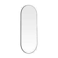 This tall oval mirror is enhanced by a minimal black metal frame, perfect for adding light to the darkest of spaces.