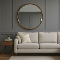 Mega wooden round mirror for over a fireplace, in a living room or hall.