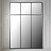 Tall, black metal rectangular mirror with three squares to the top, a great window mirror. Perfect used outside or indoor. Always a great way to allow light and perspective into an industrial space. 