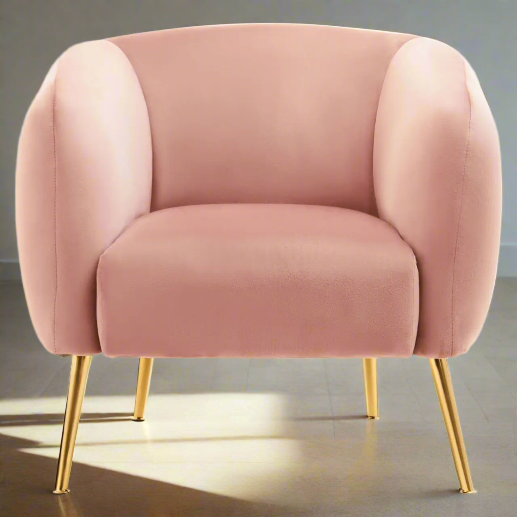 Pretty, pale pink occasional armchair with splayed gold metal legs. Another colour in this particular range of chairs, comfy yet so stylish. The Salmon pink colour would look great in a bedroom or dressing room and what young girl wouldn't love this colour in their room, so glamorous !! H: 100 cm W: 79 cm D: 72.5 cm