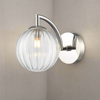 Stylish polished nickel wall light with a clear ribbed glass. It creates an instant classy and elegant feel. With an IP Rating 44, it can be use in the bathroom 