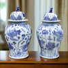 Pair of aged ceramic ginger jars in the traditional Chinese blue and white style. So decorative in any room on any surface, these are tall enough to stand on the floor, either side of fireplace or on a table,&nbsp; Looking good with any style of interior adding colour and interest.