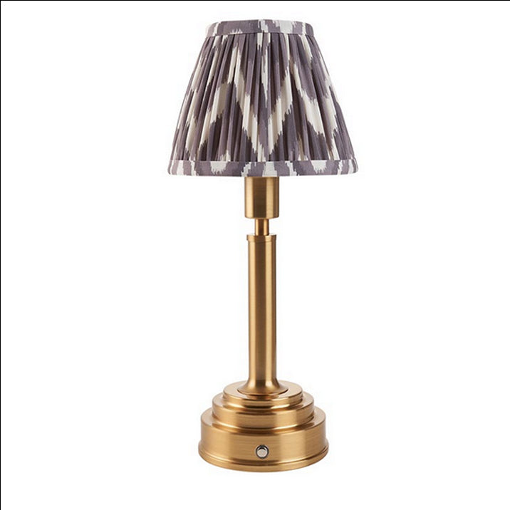 Brushed gold, rechargeable table lamp with a USB port. This portable, rechargeable 3 stage touch dimmer table lamp