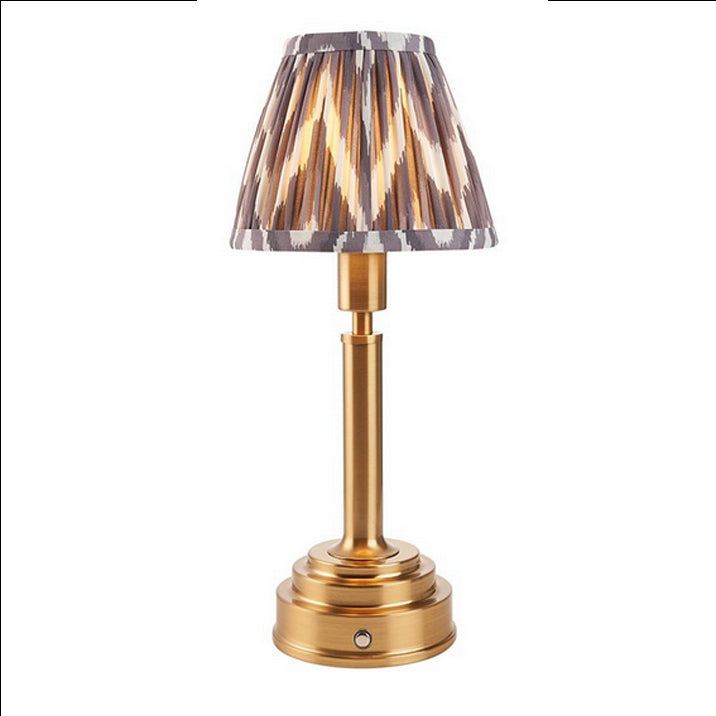 Brushed gold, rechargeable table lamp with a USB port. This portable, rechargeable 3 stage touch dimmer table lamp