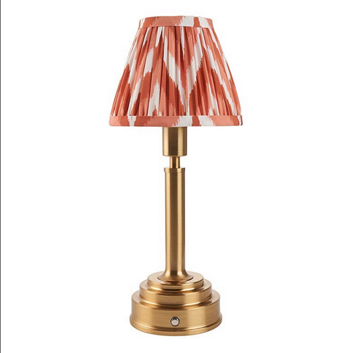 Brushed gold, rechargeable table lamp with a USB port. This portable, rechargeable 3 stage touch dimmer table lamp