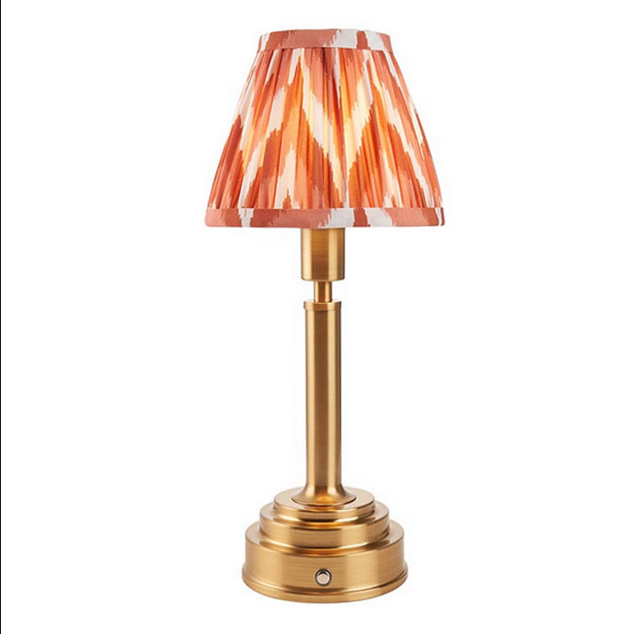 Brushed gold, rechargeable table lamp with a USB port. This portable, rechargeable 3 stage touch dimmer table lamp