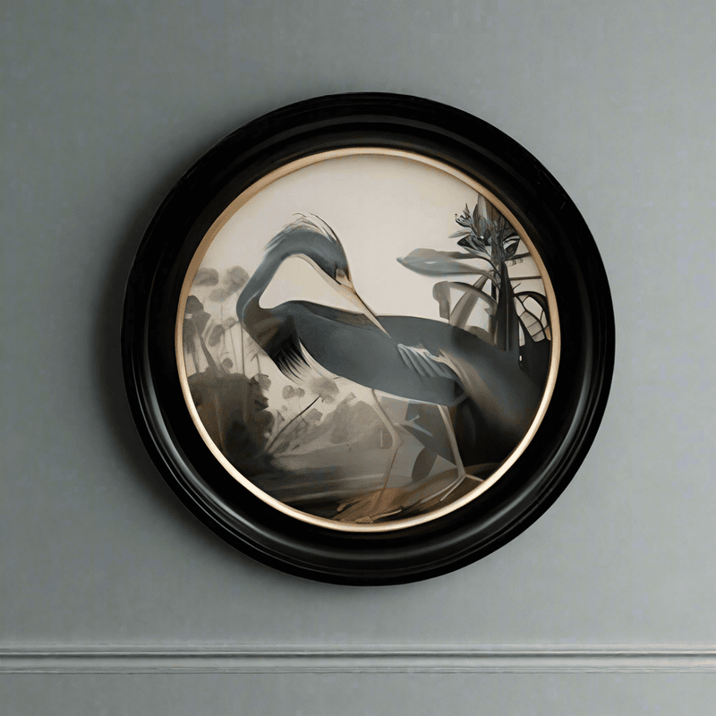 Blue heron wall print in a classic black and gilt frame, a medium size of this print will make an impact on any wall. The style is reminiscent of 19th-century ornithological illustrations 