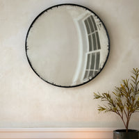 A huge, very distressed black convex mirror, the closest to the original Georgian look.&nbsp; Exceptional size and the antique finish of this mirror ensures it wouldn't look out of place in a country house. It would also work in an industrial interior.