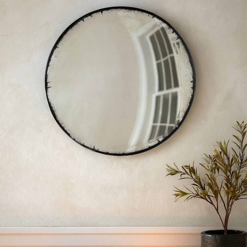 A huge, very distressed black convex mirror, the closest to the original Georgian look.&nbsp; Exceptional size and the antique finish of this mirror ensures it wouldn't look out of place in a country house. It would also work in an industrial interior.