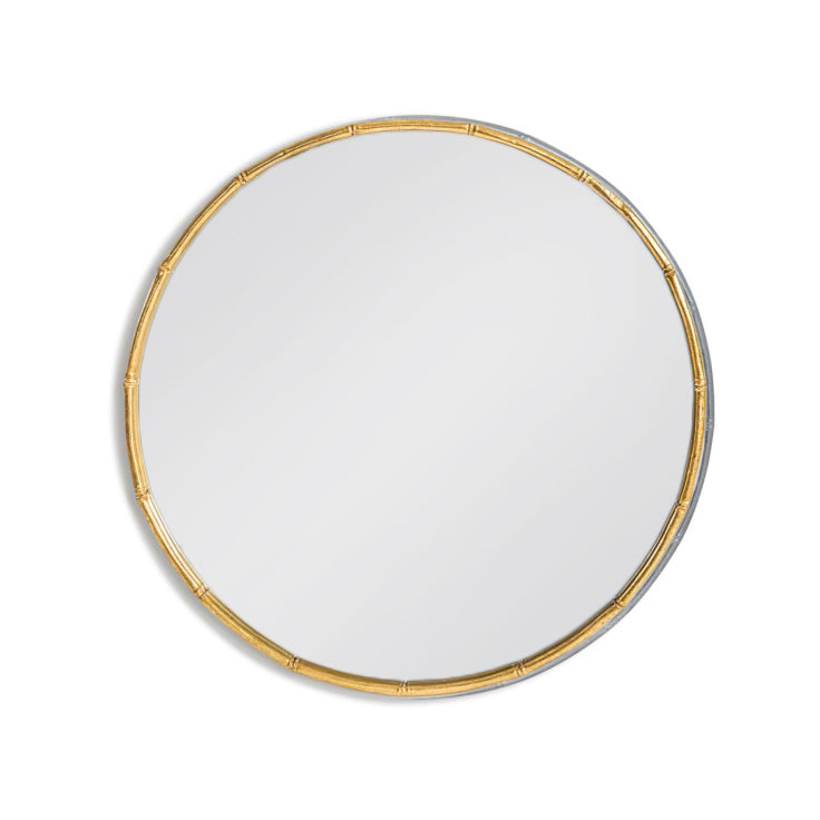 Decorative gilt, metal 'bamboo' framed circular mirror.&nbsp; The extra bamboo effect on the frame of this mirror is unusual and adds to the decorative value. In a hallway, focal point in a living area, this reflective mirror will look great in any space.