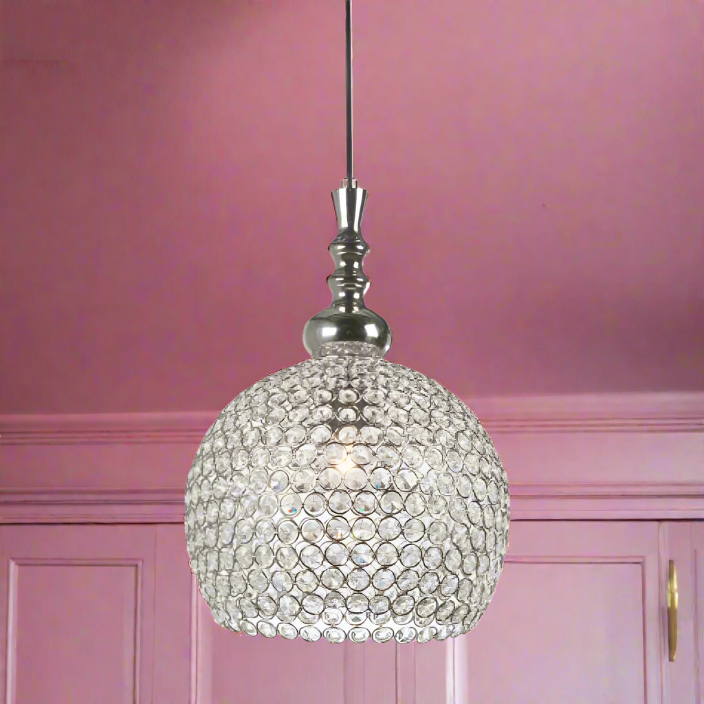 A really sparkly crystal disc pendant, give a high end look on a smaller scale, great bedroom, hall, any smaller space that needs a lift.&nbsp; The size and shape of this pretty crystal light works well in a smaller space giving the glamour of crystal in a more compact size.

H: 40 cm W: 28 cm 