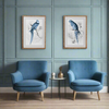 Pair of blue parrot prints in a smart faux bamboo wodden frame.&nbsp; Such a great subject, the frames are neutral so these Blue Parrot prints will fit into any interior, as at home in a Scandi town home as a country house.&nbsp; Prints of this type are a classic way to add interest to any wall, and these Parrot prints are set in a pale wooden frame of a decent size not too overpowering so a pair would fit beautifully in your living room, hall or dining room. A striking focal point for your space. There are