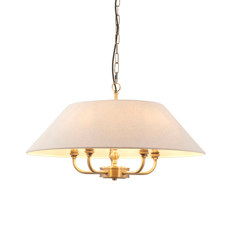 Classic shaded brushed gilt chandelier with 5 lights.&nbsp; An elegant easy way to spread light in your living room, over a dining table and an especially great light for a bedroom.&nbsp;&nbsp; The shade is a light coloured linen and the metal 5 arm light is a deep burnished, antique gold, the shade hanging from a gilt ring attached to a gilt chain.
