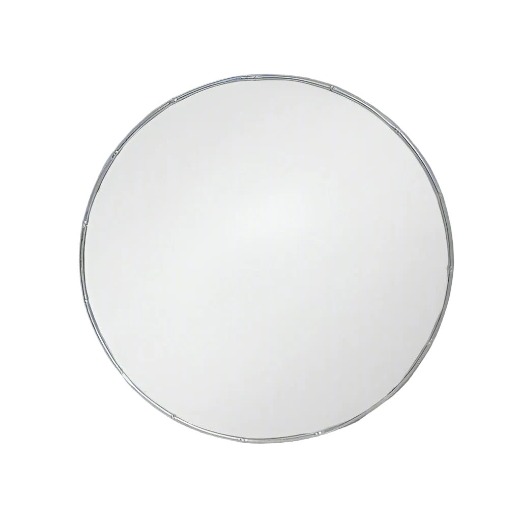 A decorative silver metal circular mirror with a bamboo frame, 