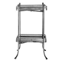 This silver iron and mirrored two-tier side table combines strength with refined detailing. Its slim, decorative frame and reflective surfaces make it a practical yet elegant addition to living rooms