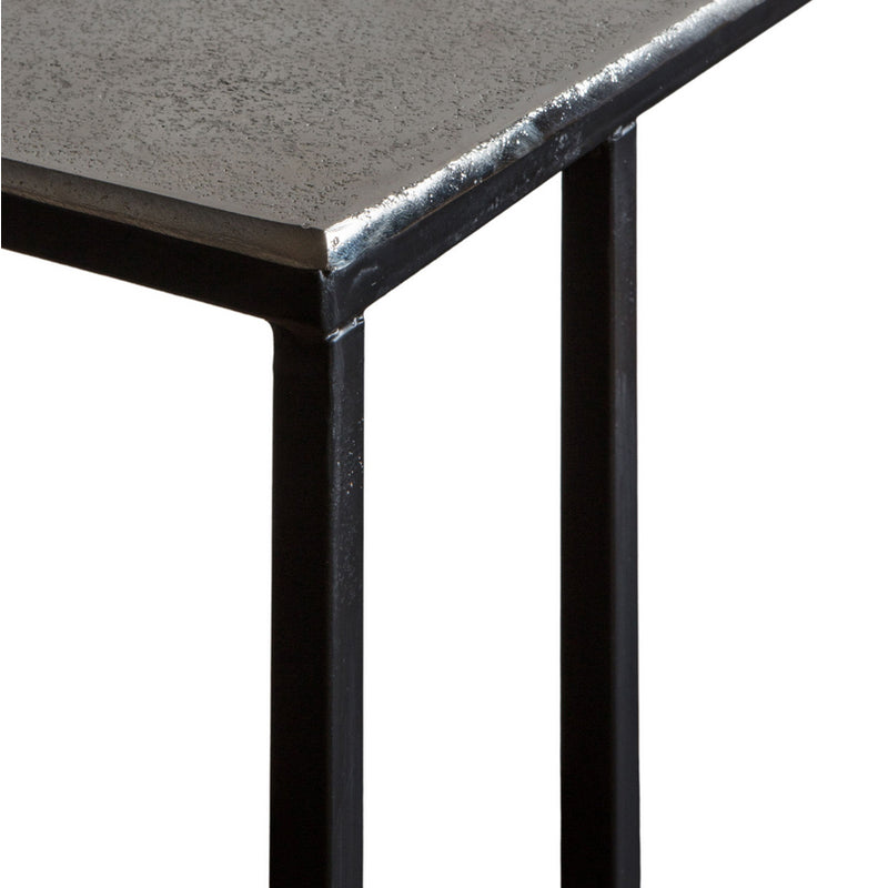 Sofa table in aluminium beaten metal with black iron legs, made to slide under a sofa. Tables in this shape are perfect space savers and in this fabrication adding glamour to any room.