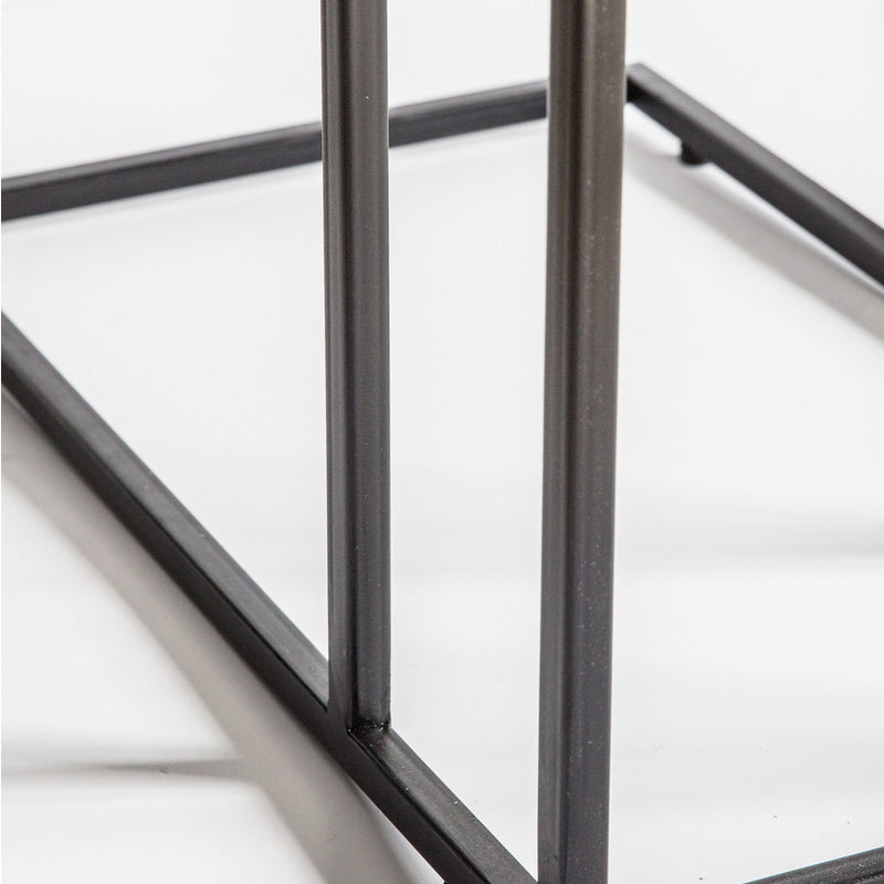 Sofa table in aluminium beaten metal with black iron legs, made to slide under a sofa. Tables in this shape are perfect space savers and in this fabrication adding glamour to any room.